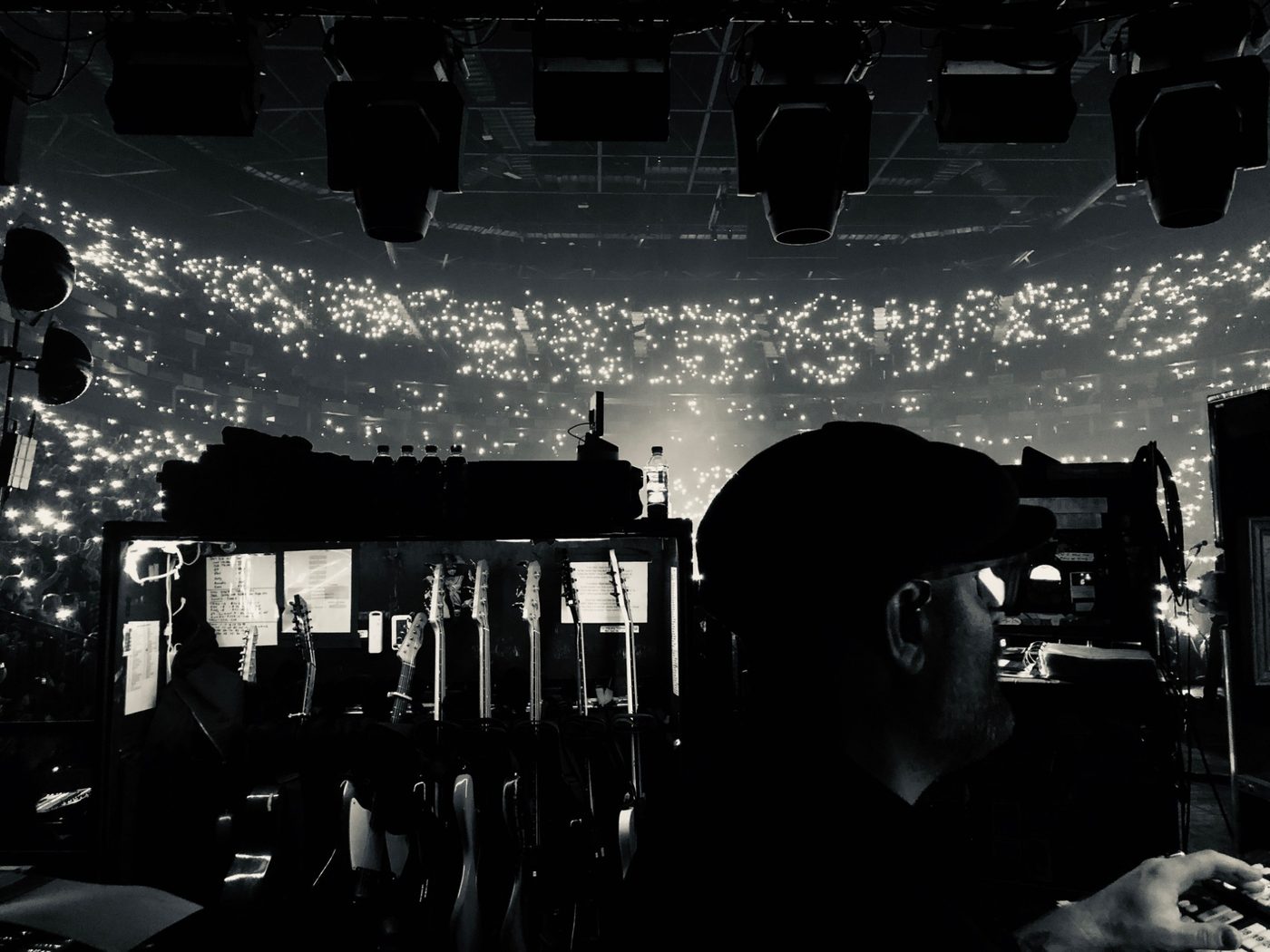 Jeff side of stage, the arena lit by phones